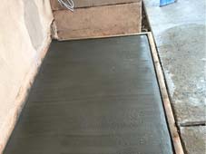 outdoor concrete slab for customer washer & dryer relocation
